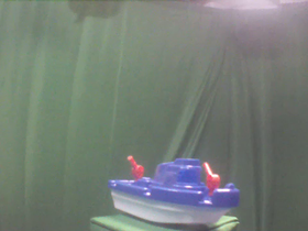 45 Degrees _ Picture 9 _ Blue and White Toy Boat.png